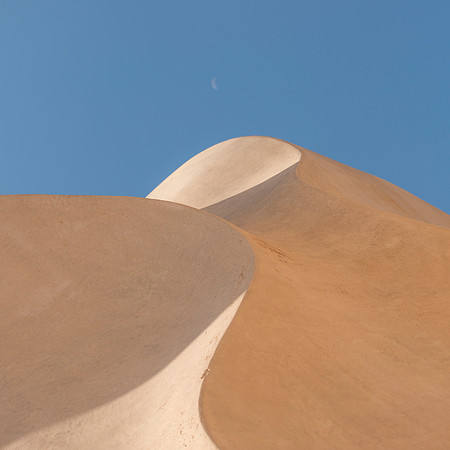 Moonset over a Dune